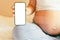 Pregnancy screen mockup. Mobile pregnancy online maternity application mock up. Pregnant mother using phone. Concept of