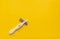 Pregnancy test on a yellow background. Close-up.