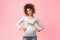 Pregnancy therapy. Afro woman holding headphones on her belly