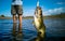 Pregnant Bass fishing on beautiful lake in South Africa closeup shot with lure
