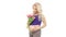 Pregnant beautiful blonde girl smelling a bouquet of tulips, white