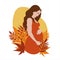 Pregnant beautiful woman hugging her pregnant belly on a yellow background with autumn leaves