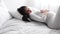 Pregnant Beautiful Woman Lying On Bed And Caressing Baby Belly