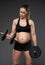 Pregnant bodybuilder lady working out