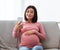 Pregnant Chinese Lady Using Phone Making Selfie Sitting At Home