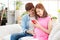 Pregnant couple use smart phone