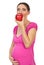 Pregnant eating red apple