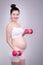 Pregnant exercises concept.A portrait of a Beautiful asian pregnant woman doing light exersice by using dumbell at home.