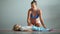 Pregnant girl doing yoga home morning