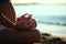 Pregnant girl doing yoga sand beach sea morning