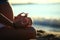 Pregnant girl doing yoga sand beach sea morning