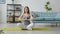 Pregnant girl sitting in lotus position on yoga mat breathing relaxing enjoying peace and tranquility