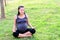 Pregnant healthy woman meditating in nature