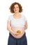 Pregnant holding apple in front of belly
