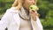 Pregnant lady with big belly feeling sick after biting apple suffering toxicosis