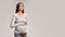 Pregnant Lady Suffering From Abdomen Pain Standing, Gray Background, Panorama
