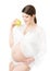 Pregnant woman with apple, pregnancy diet