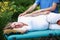 Pregnant woman arm massage by physical therapist
