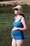 Pregnant woman bathing at sea