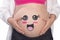 Pregnant woman belly with smiling funny face