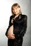 Pregnant woman in black suite