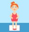 Pregnant woman cartoon stands on scales. Healthy lifestyle during pregnancy