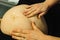 Pregnant woman checked by midwife
