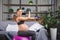 Pregnant woman is doing exercises with gymnastic ball