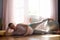 Pregnant woman doing fitness workout in Anantasana, Side Reclining Leg Lift yoga pose