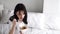 Pregnant Woman Eating Chinese Food At Home In Bed