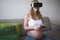 Pregnant woman enjoying VR