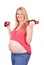 Pregnant woman exercise with dumbells