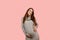 Pregnant woman. Expectation of the child. Maternity leave. Pregnancy of a happy beautiful girl in a gray sweater on a