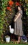 Pregnant woman in garden looking studio style