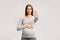 Pregnant Woman Gesturing Stop Standing Over Gray Studio Background