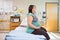 Pregnant Woman With Hands On Stomach On Hospital