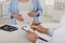 Pregnant woman having appointment at gynecologist, closeup