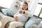 pregnant woman having labor contractions at home