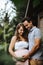 pregnant woman and her husband sharing some joyful moments