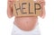 Pregnant woman holding help sign