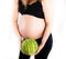 Pregnant woman holding watermelon in her hands. Healthy lifestyle dieting