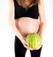 Pregnant woman holding watermelon in her hands. Healthy lifestyle dieting