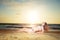 Pregnant woman lay on the sand beach resting