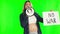 Pregnant woman, megaphone and no war billboard on green screen for protest against a studio background. Portrait of