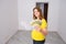 Pregnant woman with money in hand to buy a house. Euro for repair, furniture and decoration of the apartment. Discounts and bonus