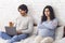 Pregnant woman offended to husband that playing games on laptop computer