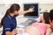 Pregnant Woman And Partner Having 4D Ultrasound Scan