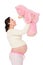 Pregnant woman with pink teddy bear