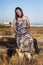 Pregnant woman poses on the marshlands