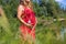 Pregnant woman posing in the woodlands
